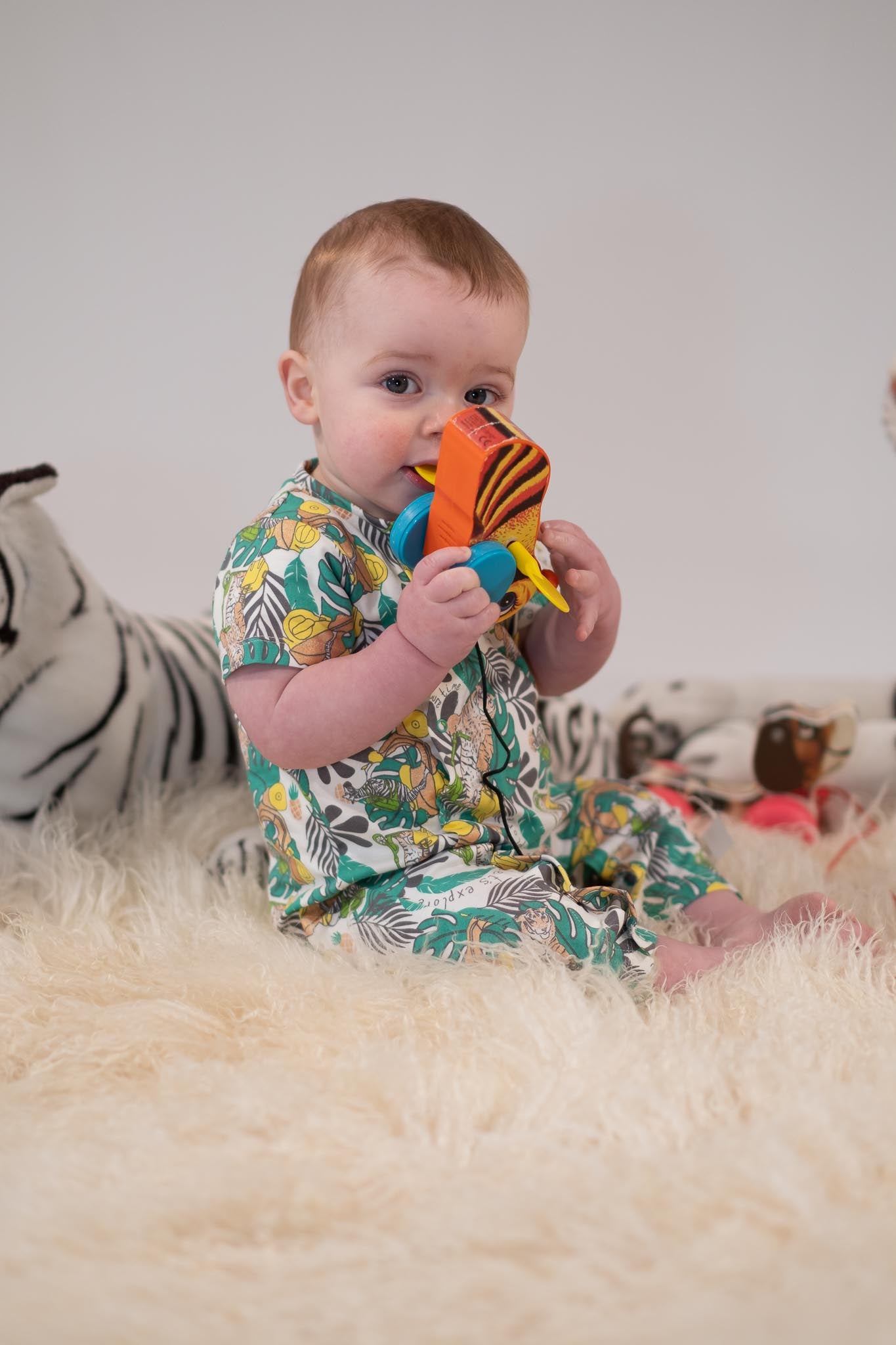 BABY JUNGLE PRINT LONG SLEEVE PLAYSUIT