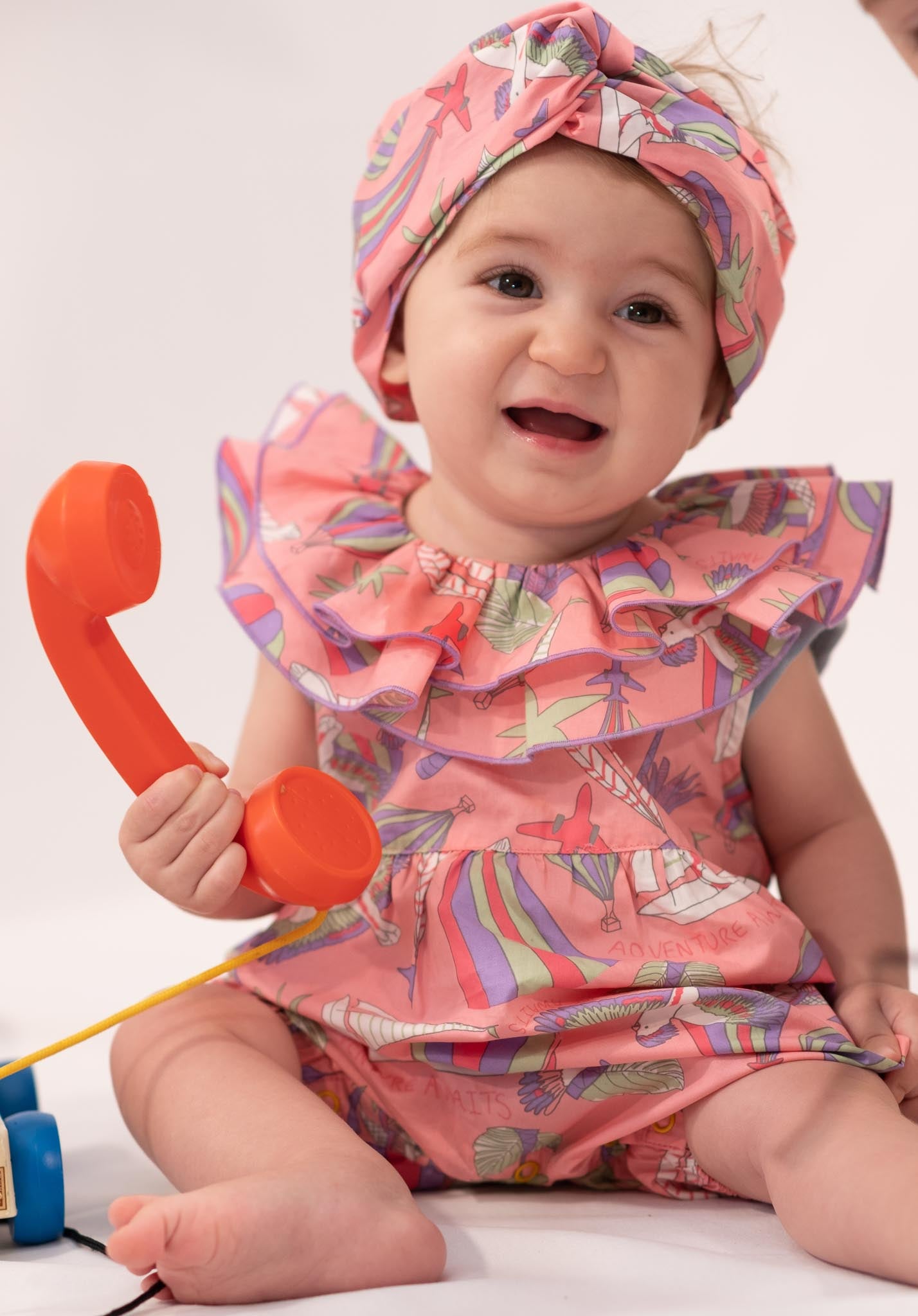 BABY PARROT FRILL NECK PLAYSUIT