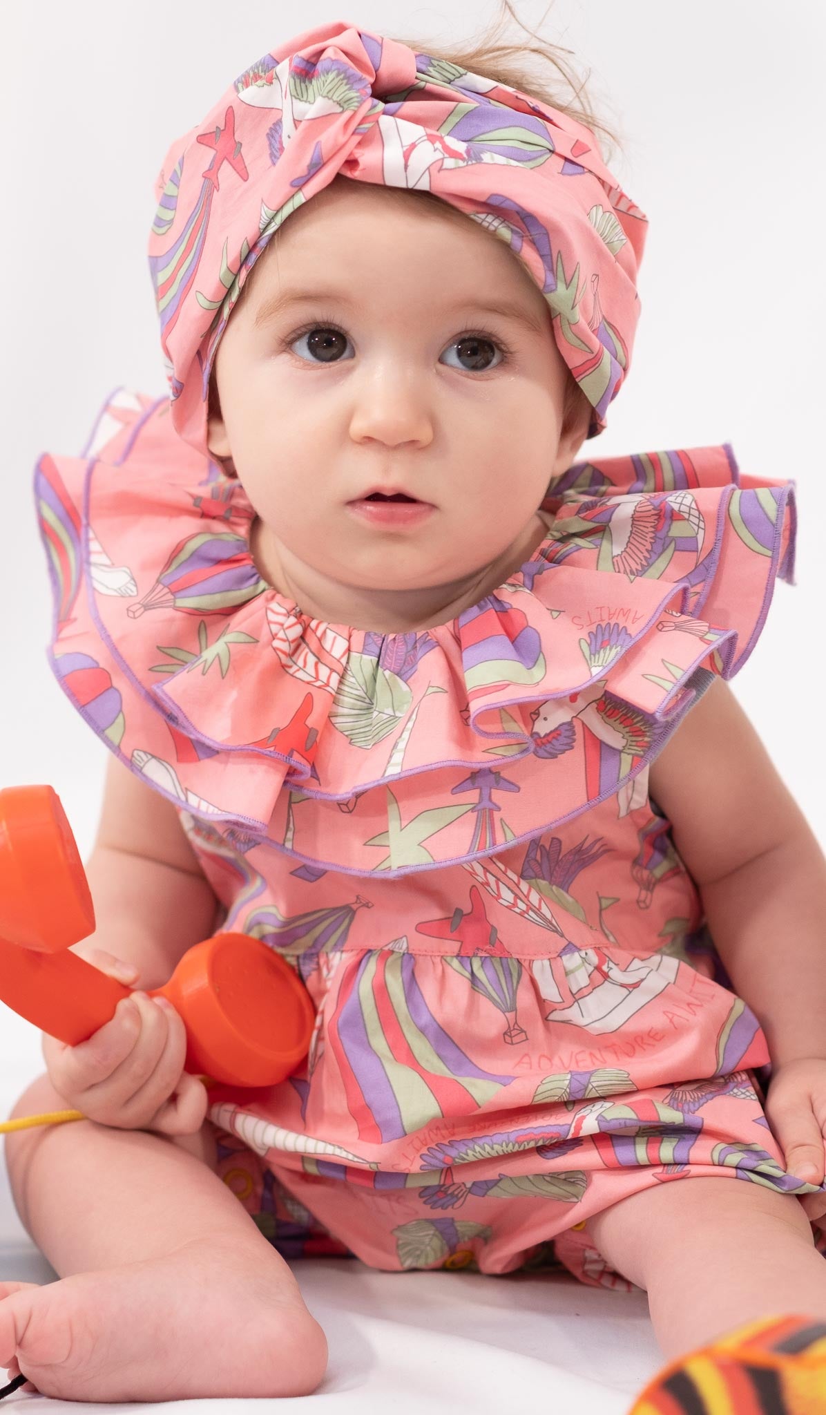 BABY PARROT FRILL NECK PLAYSUIT